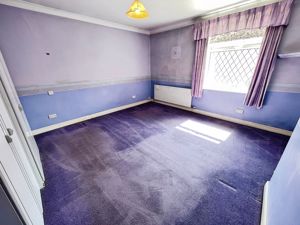 Bedroom One- click for photo gallery